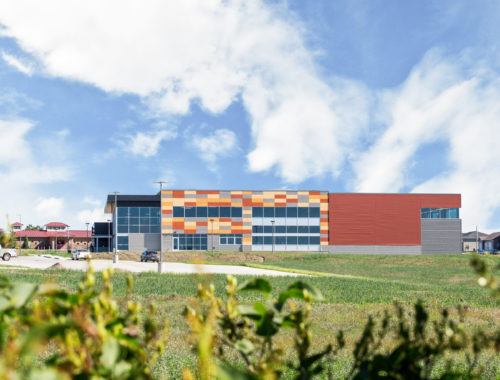 Energy Wellness Center Exterior view with field in foreground